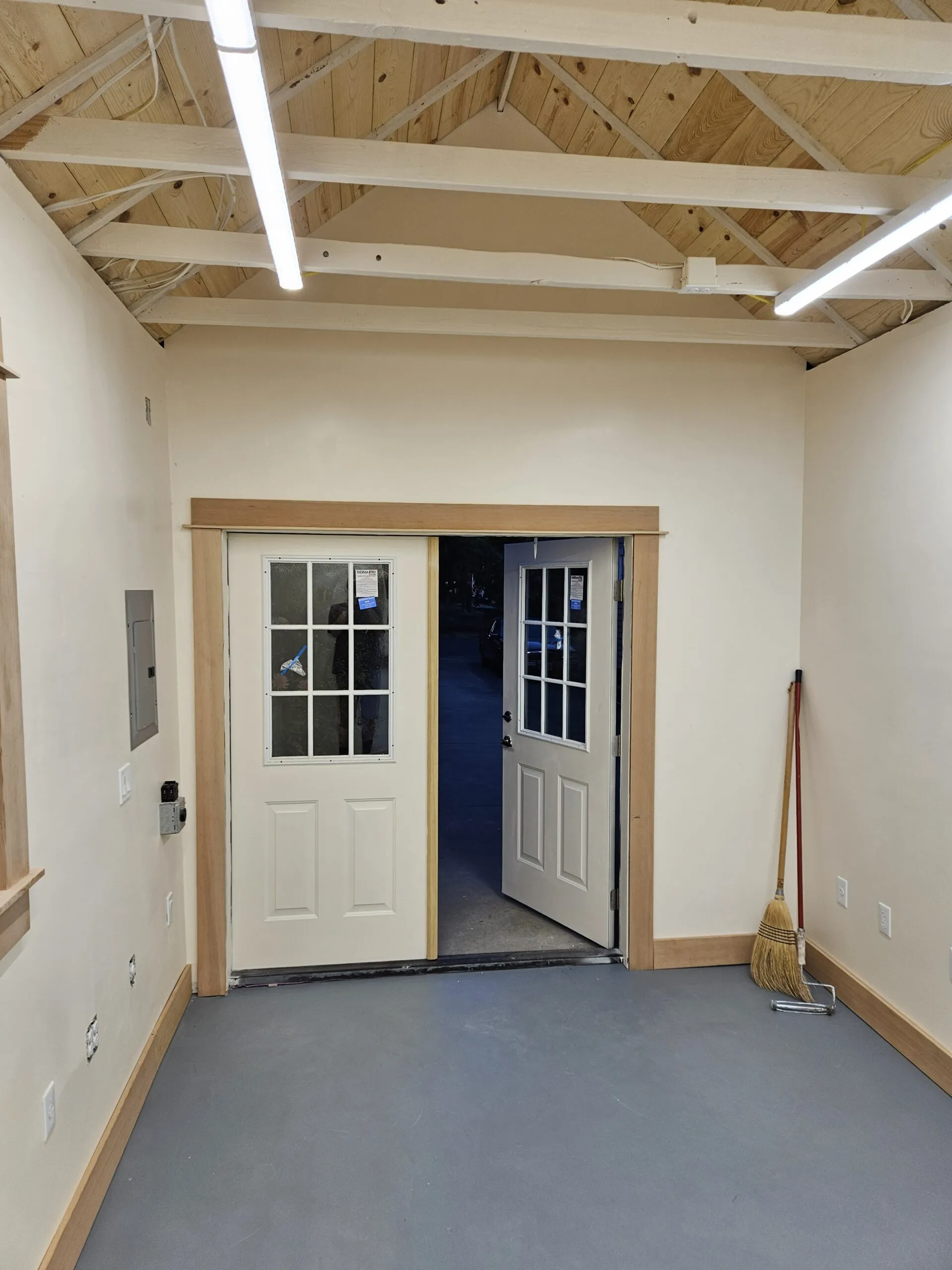 Garage ADU interior remodel with exposed trusses