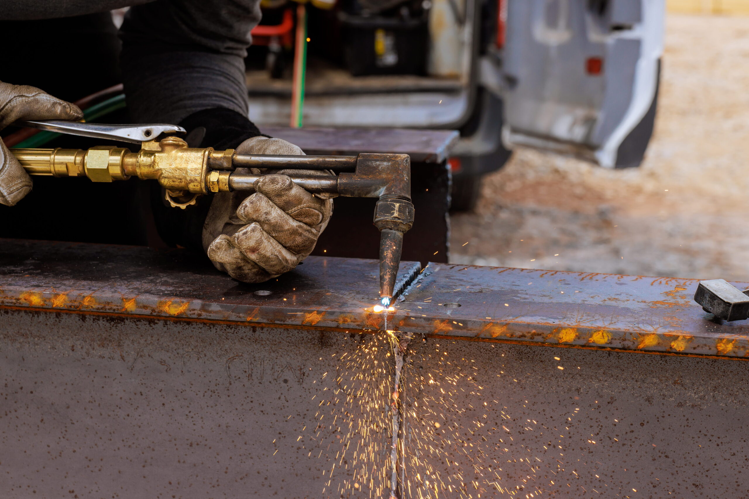 metal cutting with oxy-acetylene torch during welding fabrication work